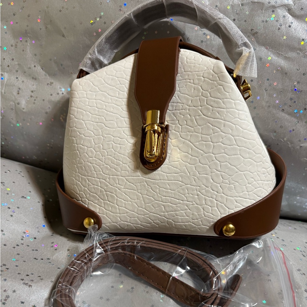 White/brown soft vegan leather Hand Bag w/crossbody strap (approx 7 1/2x6 1/2)